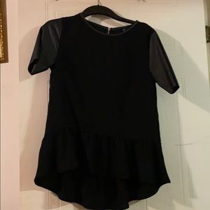 Black shirt with leather sleeve